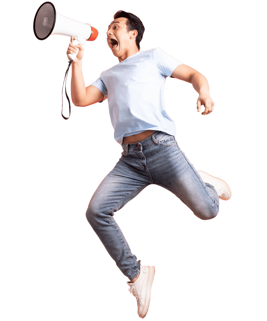 man in white shirt jumping with megaphone in hand