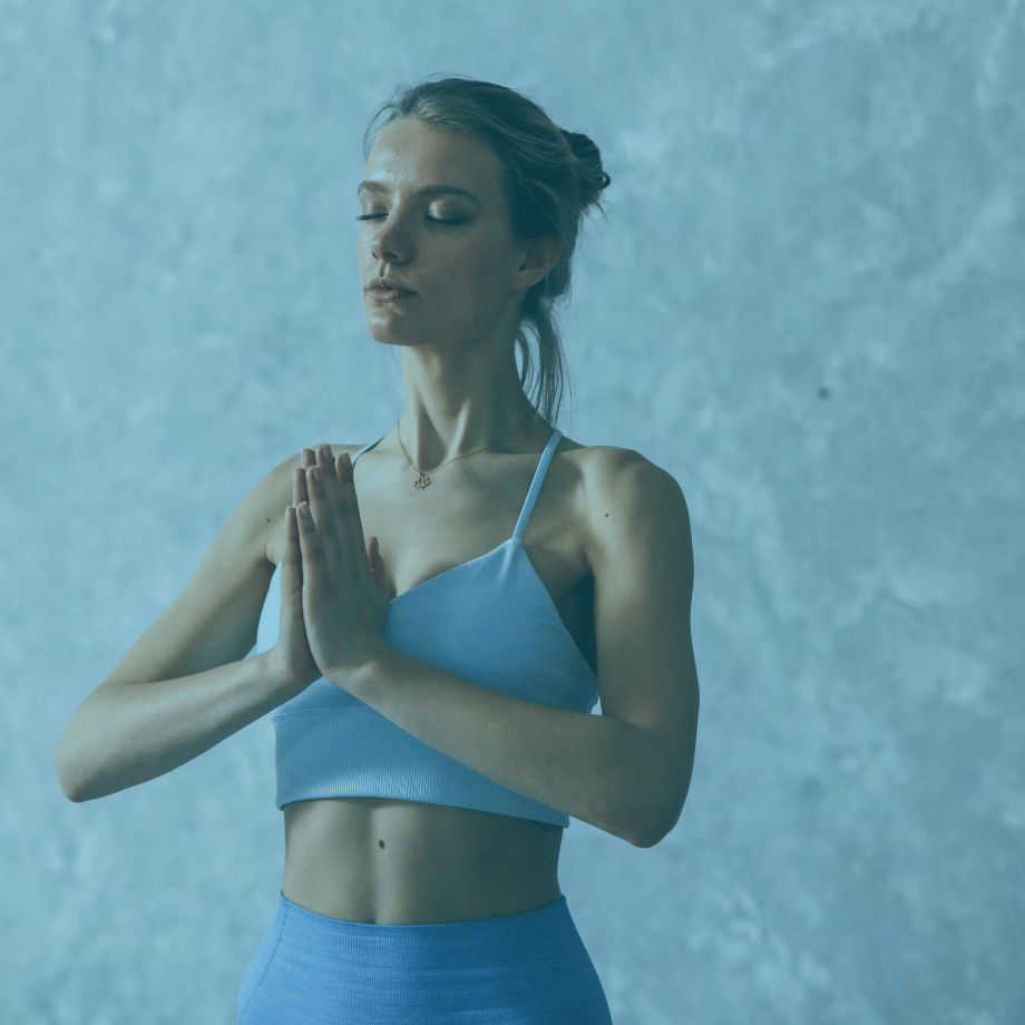 Woman posing while doing yoga